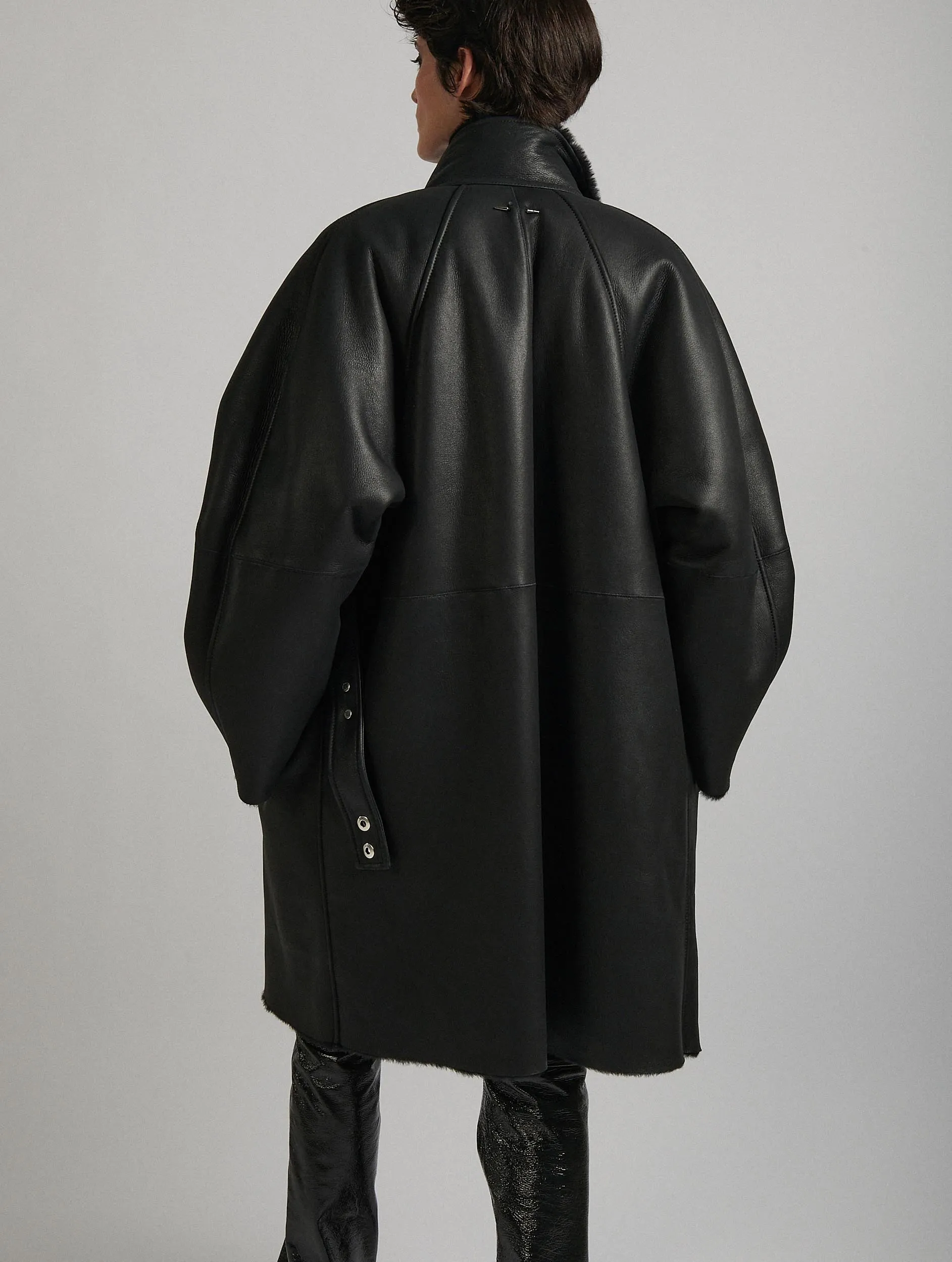 Black shearling high-collar coat